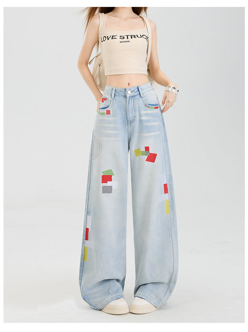 Geometric embroidered jeans