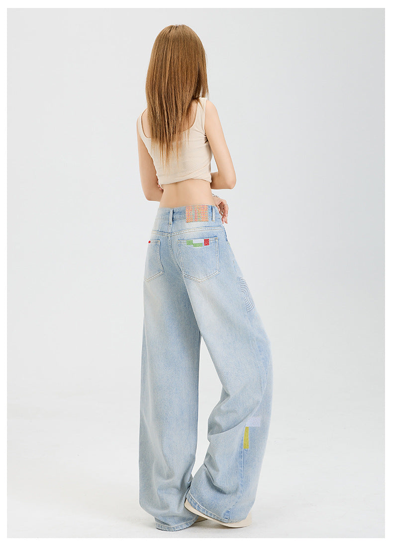Geometric embroidered jeans