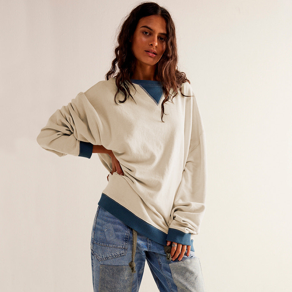 Apricot colour-blocked ribbed long-sleeve top shown on the model