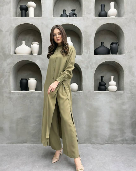 Grass green long stand-collar shirt and straight-leg trouser two-piece set worn full length, with the self-tie sash knotted at the waist
