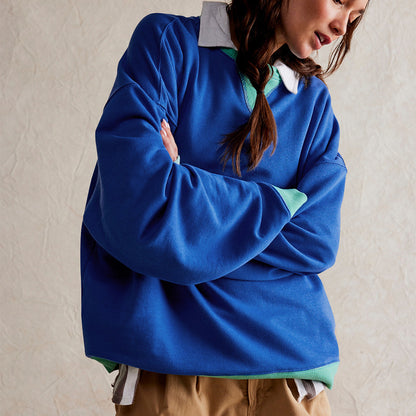 Blue colour-blocked ribbed long-sleeve top worn oversized on the model