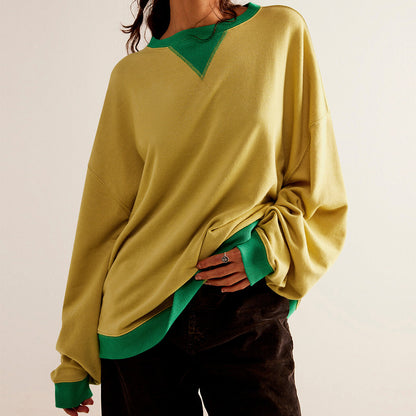 Yellow colour-blocked ribbed long-sleeve top shown on the model in the oversized fit