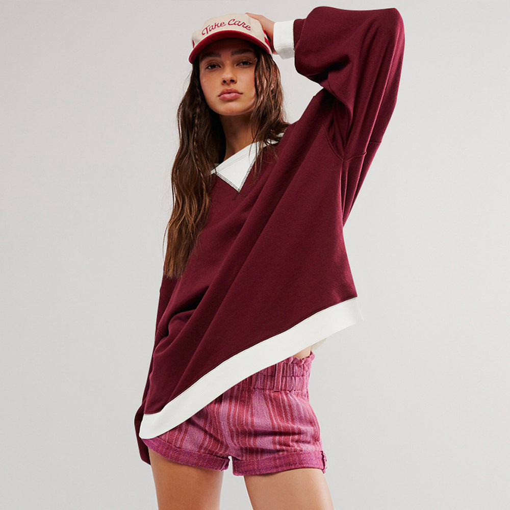 Burgundy colour-blocked ribbed long-sleeve top worn on the model
