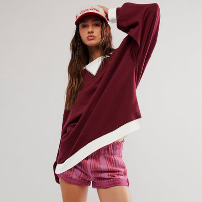 Burgundy colour-blocked ribbed long-sleeve top worn on the model