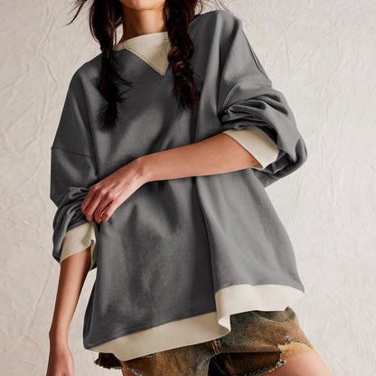 Gray colour-blocked ribbed long-sleeve top shown on the model