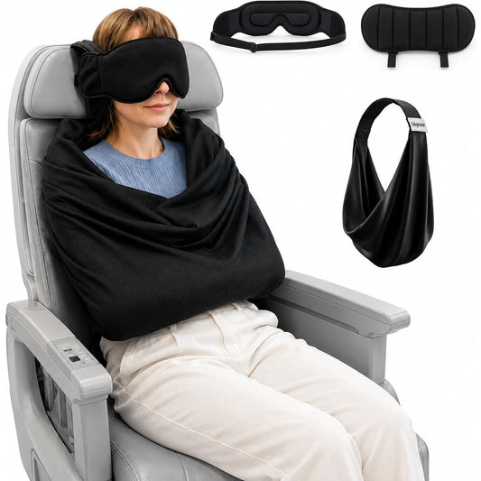 Woman wearing the 3-in-1 travel sleep kit on an airplane, eye mask attached to the headrest