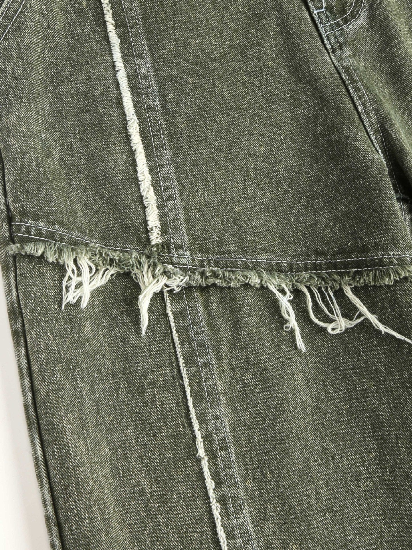 Raw edge panelled jeans