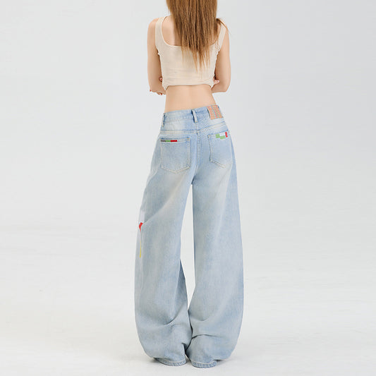 Geometric embroidered jeans