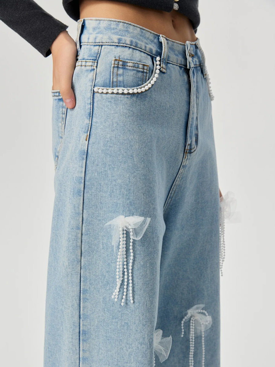 Denim trousers with 3D decoration