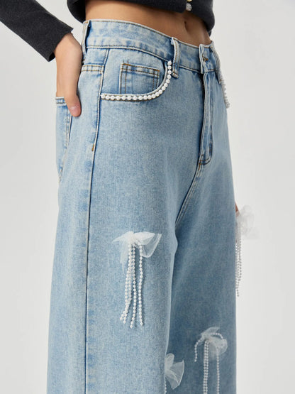 Denim trousers with 3D decoration
