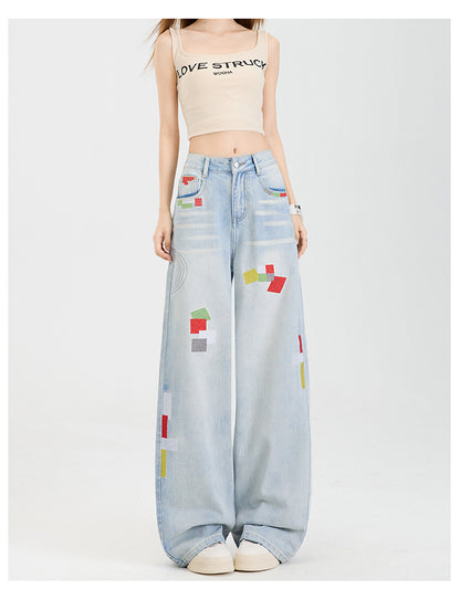 Geometric embroidered jeans