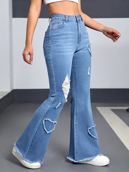 Heart pattern ripped jeans
