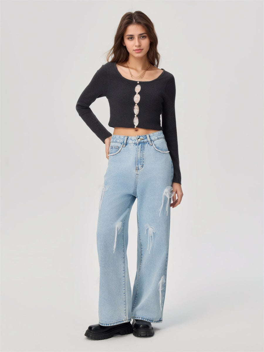 Denim trousers with 3D decoration