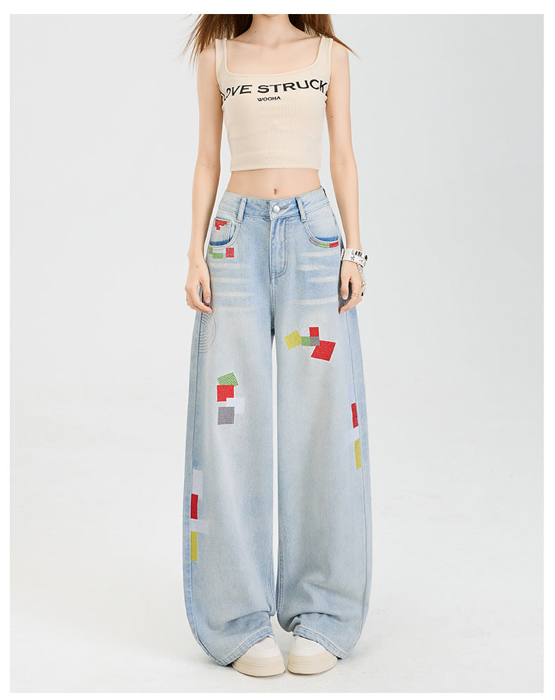 Geometric embroidered jeans