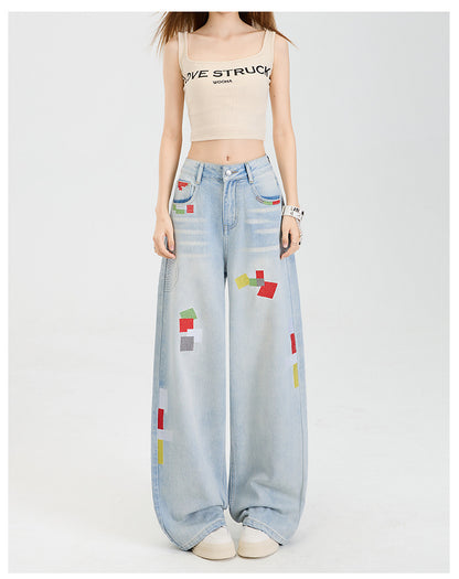 Geometric embroidered jeans