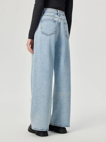 Denim trousers with 3D decoration