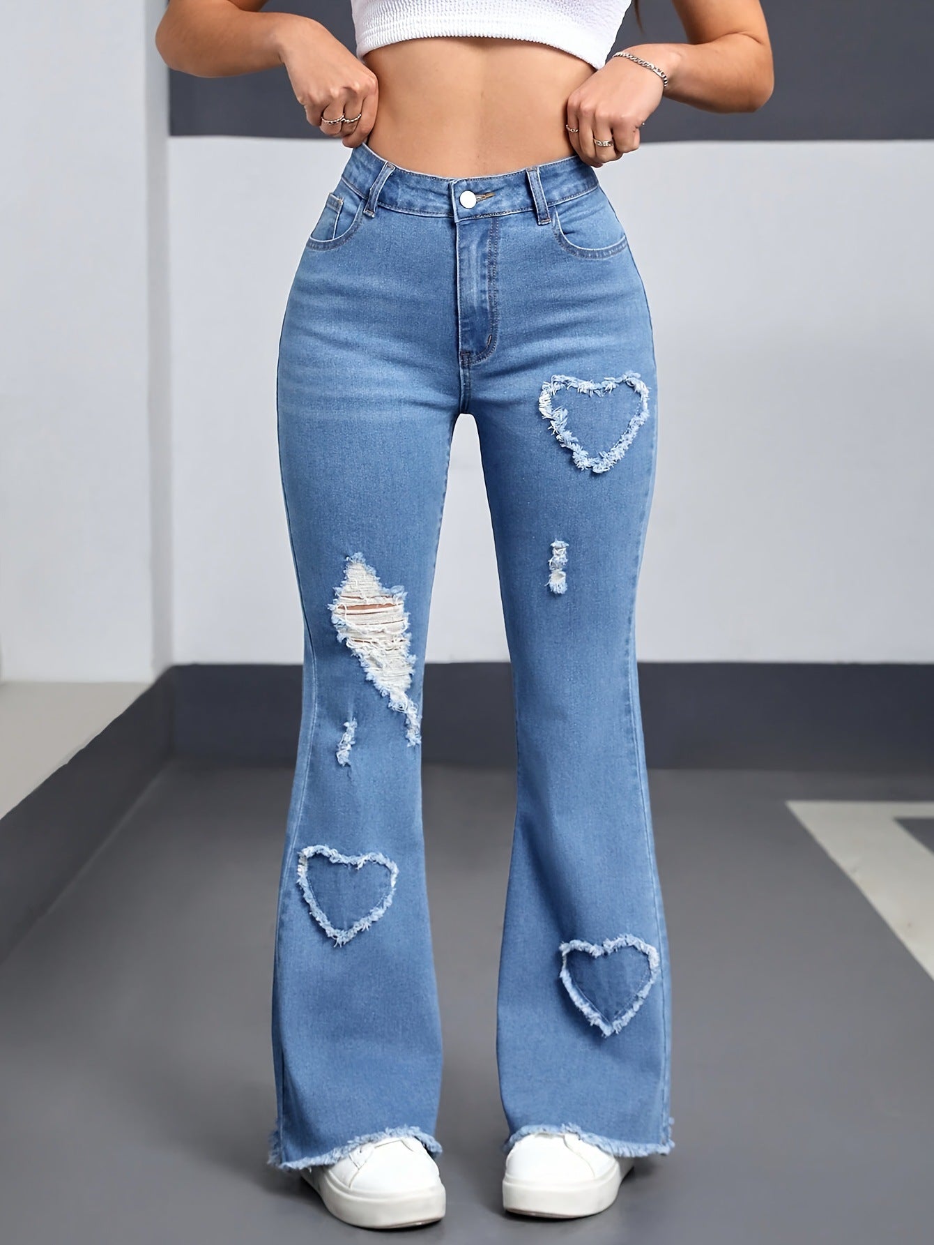 Heart pattern ripped jeans