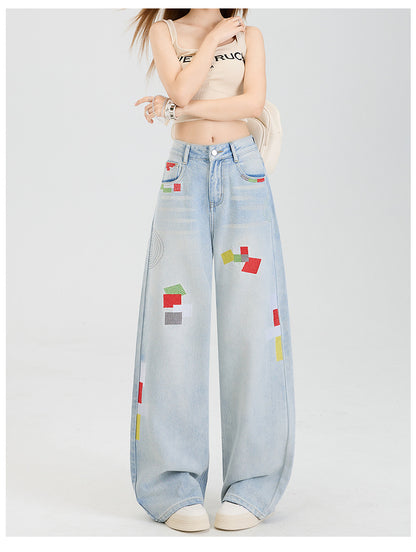 Geometric embroidered jeans