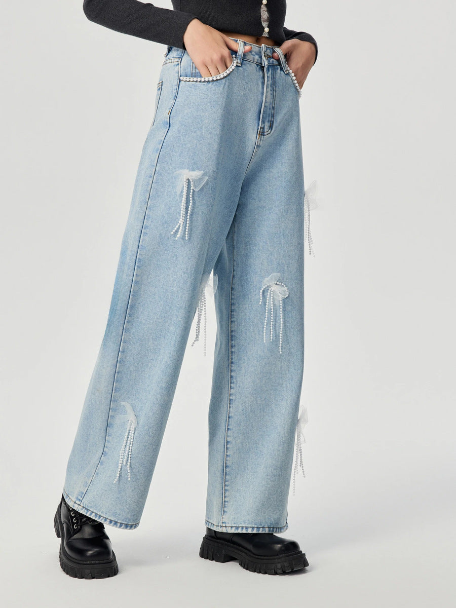 Denim trousers with 3D decoration