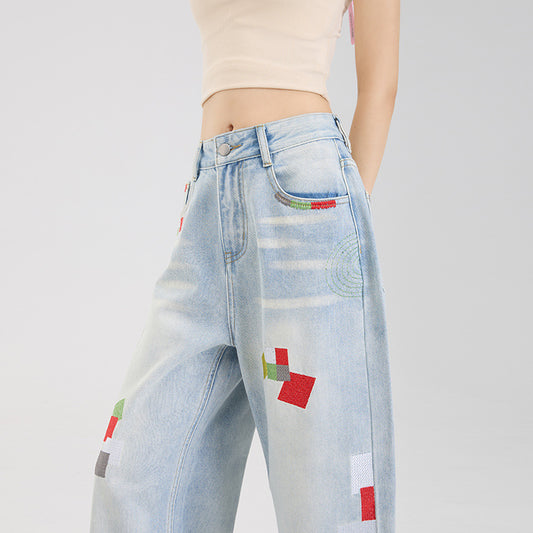 Geometric embroidered jeans
