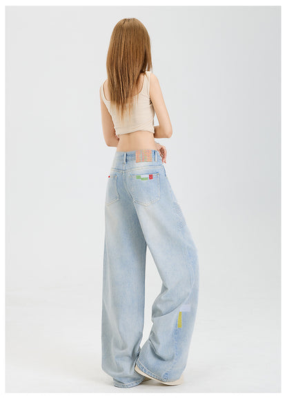 Geometric embroidered jeans