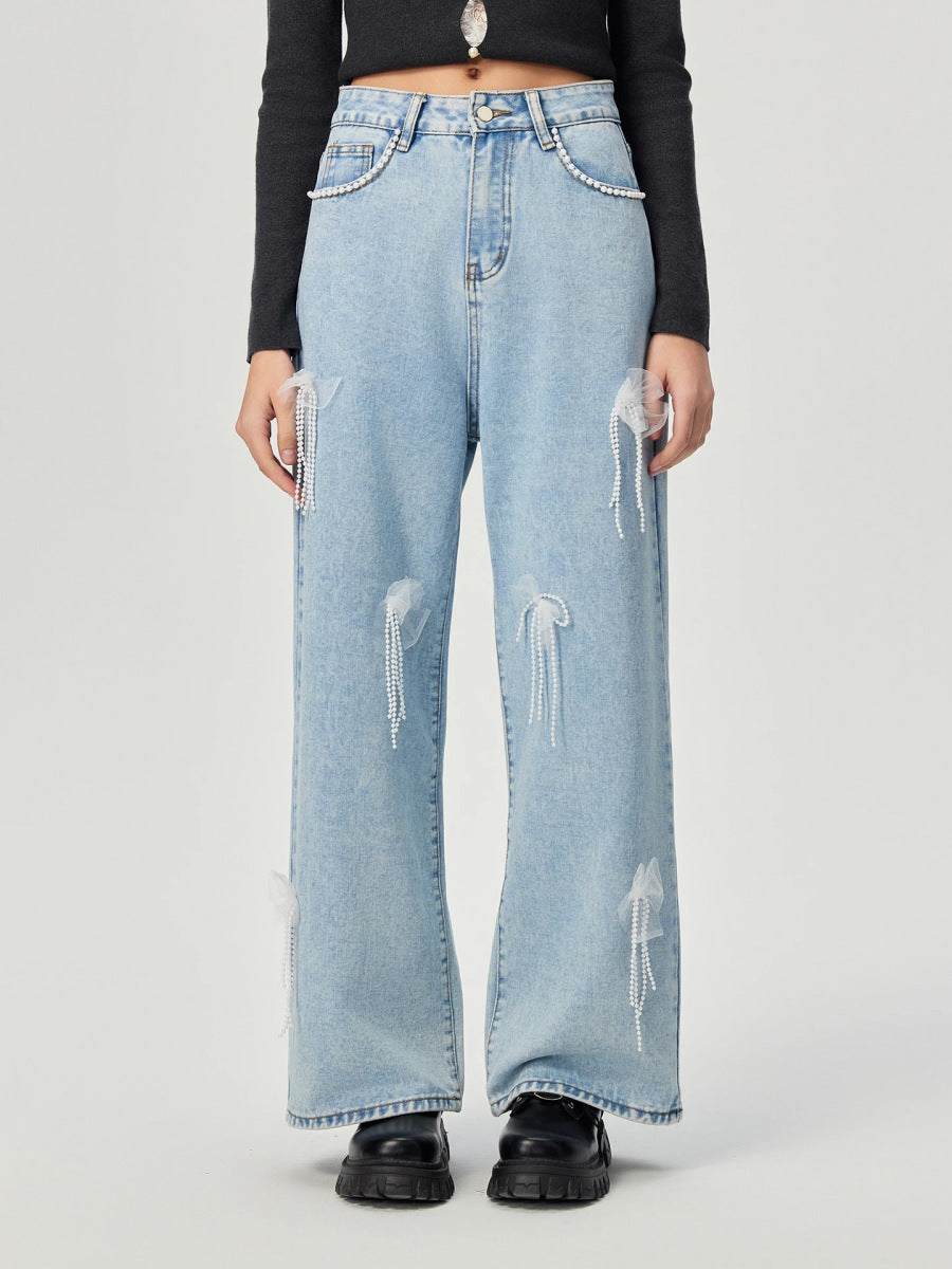 Denim trousers with 3D decoration
