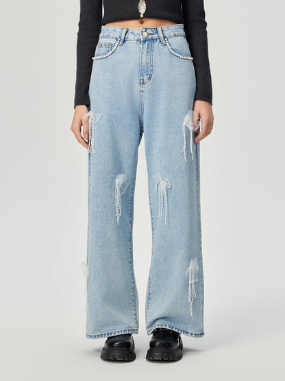 Denim trousers with 3D decoration