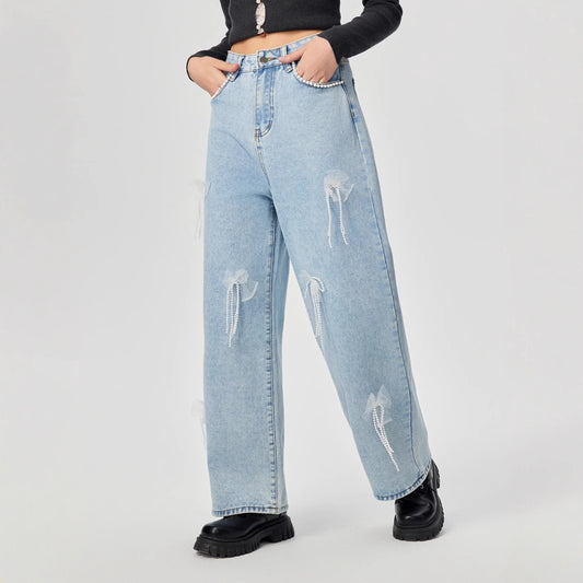 Denim trousers with 3D decoration