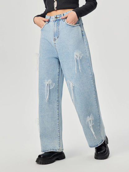 Denim trousers with 3D decoration