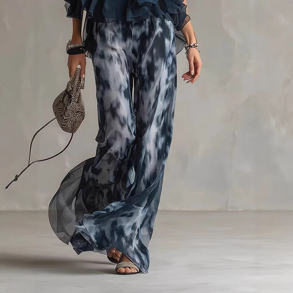 A halter-neck ruffled chiffon top and tie-dye wide-leg pants set - BundleWear