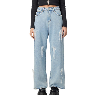 Denim trousers with 3D decoration