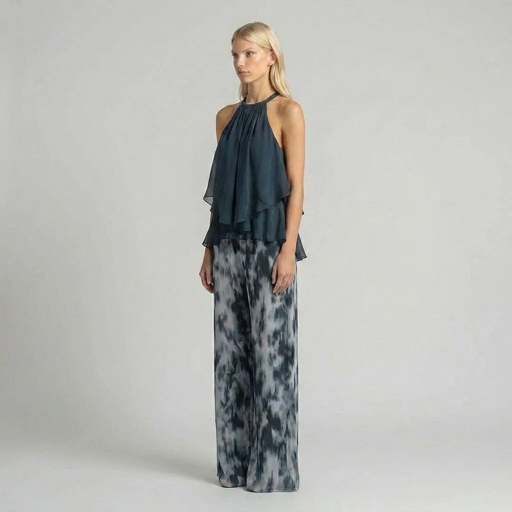 A halter-neck ruffled chiffon top and tie-dye wide-leg pants set - BundleWear