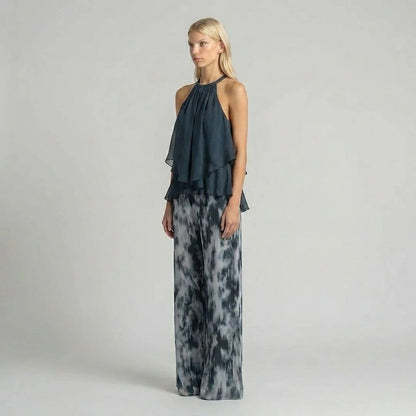 A halter-neck ruffled chiffon top and tie-dye wide-leg pants set - BundleWear